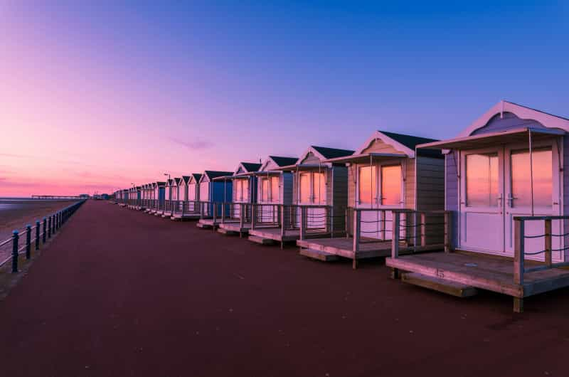 Beach huts at St Annes (Mark Mc Neill on Unsplash)