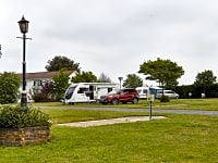 The electric hardstanding touring pitch at Vauxhall Holiday Park The electric hardstanding touring pitch at Vauxhall Holiday Park