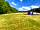 Warbleton Farms Campsite: Visitor image of Brooks #2. Toilet in the picture and bench and campfire to the left.