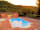 Camping Le Gallo Romain: Swimming pool at sunset