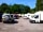 The Victoria - Bikers Pub: one of the two parking facilities with tent lots on grass at the rims