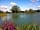 The Halfway Caravan and Camping Park: View over the lake by the inn