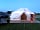 Wild Meadow Glamping: Tent lit up on a night