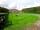 Church Stile Farm Holiday Park: Grass area for tents: flat land with ample space for parking next to your tent