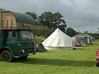 The campsite on a summer's day - we welcome large tents The campsite on a summer's day - we welcome large tents