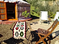 A small landscaped garden and terrace come with the yurt A small landscaped garden and terrace come with the yurt