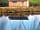 Barstobrick Holiday Lodges: Lodge reflection in the pond