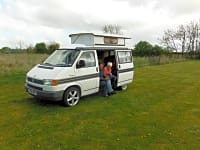 Behind this camper you can see the huge dog-walking area with paths cut in the grass Behind this camper you can see the huge dog-walking area with paths cut in the grass