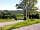 Newgrange Lodge Campsite: Entrance and pathways with a view of the Hill of Dowth in the background