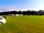 Folly Farm Caravan and Camping Park: Almost empty camping field and campers on EH field.