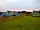 Green Haven Camping: Sun setting over the pitches field