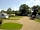 Plough Lane Caravan Site: Pitches shaded by trees