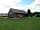Tall Trees Touring Park: Grass pitches near the facilities building
