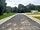 The High Hermitage Holiday Park: Access to touring pitches RHS camping on LHS