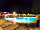 Torre Pendente Camping Village: The swimming pool at night