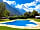 Dolomiten Camping Amlacherhof: Visitor image of the lovely clean pool with stunning backdrop