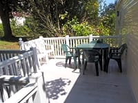 Outside deck area with table and chairs Outside deck area with table and chairs