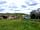 The Gaggle of Geese: View of the washing up/drinking water station (left), toilets/showers and shepherd hut accom option (photo added by  on 13/05/2019)