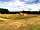 Benville Manor Camping: View of right side of field taken from near the facilities (photo added by felicity_m212721 on 30/08/2022)