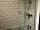 The Downs Stables: Shower and bath area (photo added by manager on 04/05/2022)