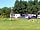 The Barn Caravan Park: Playing area in the middle of the site.  