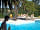 Camping Côté Ô Port Manech: Loungers by the outdoor pool