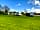 Northwood Caravan and Holiday Park: Grassy areas behind the pitches
