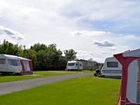Hardstanding and grass pitch Hardstanding and grass pitch