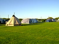 Parcel·la de gespa sense electricitat per a tenda de campanya o per a remolc tenda
