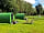 Drymen Camping: Green Pods with Standard Pitches in the distance (photo added by manager on 22/08/2022)