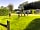 Riverside Caravan Park at The George: Kids enjoying the sunshine and a spot of badminton. (photo added by visitor on 08/05/2018)