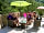Camping Le Gallo Romain: Enjoying the sun with a drink outside