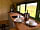 Barnharrow Holiday Pods: Kitchenette area with microwave, toaster, kettle, two-ring hob, fridge and breakfast bar