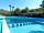 Camping Azahar: Outdoor swimming pool with space to sunbathe or relax under the shade of trees