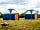 Pilton Yurt Camps: Firepit in front of the yurts