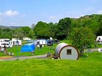 Gypsy Pod looking across the field with mountain views Gypsy Pod looking across the field with mountain views