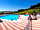 Camping Panorama: The swimming pool and paddling pool are surrounded by a large sun terrace