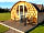 Riverside Caravan Park: Log pod with outdoor seating