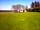 Rhosfawr Caravan and Camping Park: Tree-lined field