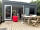 Trekenning Tourist Park: Camping pod and seating area