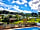 Calloose Caravan Park: View of the pool and park from the sun lounge spot