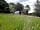 Marwell Resort: Camping pod through the long grass