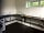 The Pepper Pot Caravan Park: The washing up room with washing machine in the corner.