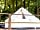 Woodcock Farm: Beech Belle - 5m safari bell tent, with windows, curtains, and fitted flooring.