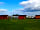 Tayview Caravan and Camping Park: Glamping cabins with the tent area in the foreground and the touring area in the background