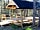 Camping Pod Heaven: Covered seating area with electric light