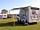 Fishery Creek Touring Park: Standard Plus pitches are located one row back from the creek