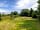 Nether Hall Farm: Pitch sheltered by trees (photo added by manager on 01/07/2021)