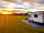 Grange Farm Lodge: Visitor image of the spacious pitches at sunset