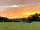 Graston Copse Holiday Park: Sunset over the site (photo added by manager)
